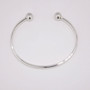 Silver torque bangle top