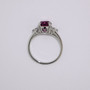 Platinum fuchsia garnet and round brililant cut diamond ring top