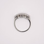 Platinum triple cluster diamond ring top