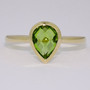 9ct gold fancy pear cut peridot rubover ring