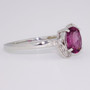 9ct white gold oval cut raspberry garnet and diamond ring side