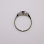 Platinum round cut unheated purple sapphire and round brilliant cut diamond ring top
