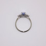 Platinum unheated rectangular cushion cut sapphire and round brilliant cut diamond ring top