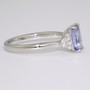 Platinum unheated rectangular cushion cut sapphire and round brilliant cut diamond ring side