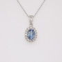 18ct white gold oval cut aquamarine and round brilliant cut diamond cluster pendant