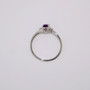 9ct white gold oval cut amethyst and diamond twist ring top