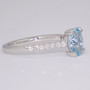 9ct white gold oval cut aquamarine ring with diamond shoulders side