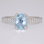9ct white gold oval cut aquamarine ring with diamond shoulders