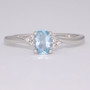 9ct white gold oval cut aquamarine and diamond twist ring