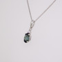 9ct white gold oval cut teal sapphire and round brilliant cut diamond pendant side