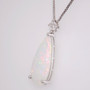 Unique 9ct white gold opal and diamond pendant side