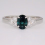 9ct white gold oval cut teal sapphire and diamond ring