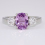 Platinum cushion cut unheated purple sapphire and round brilliant cut diamond ring