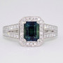 18ct white gold emerald cut unheated teal sapphire and diamond cluster ring