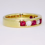 18ct yellow gold ruby and diamond eternity ring side