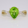 9ct gold pear cut peridot and crossover diamond-set shoulder ring