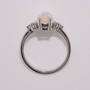 Long cushion cut Ethiopian water opal ring with diamonds top