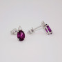 9ct white gold oval cut grape garnet and round brilliant cut diamond stud earrings