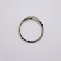 Platinum curved wishbone ring with seven round brilliant cut diamonds top
