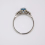 Platinum oval cut aquamarine and six round brilliant cut diamond ring top