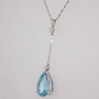 Unique 9ct white gold pear cut fine blue aquamarine and round brilliant cut diamond bar pendant side