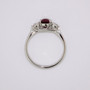 Platinum oval cut ruby and round brilliant cut diamond ring top