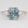Platinum unheated octagonal Burmese teal sapphire and round brilliant cut diamond ring