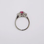 Platinum unheated cushion cut padparadscha sapphire and round brilliant cut diamond ring top