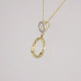9ct gold pendant with twisted gold ring and diamond-set circle side