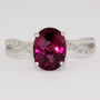 9ct white gold oval cut raspberry garnet and diamond ring 9ct white gold oval cut raspberry garnet and diamond ring