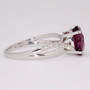 9ct white gold oval cut raspberry garnet and diamond ring side 9ct white gold oval cut raspberry garnet and diamond ring side