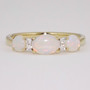 9ct gold triple opal cabochon and round brilliant cut diamond ring
