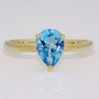 9ct gold pear cut blue topaz ring