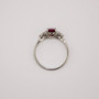 Platinum oval cut ruby and round brilliant cut diamond ring top