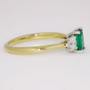 18ct gold emerald cut emerald and round brilliant cut diamond ring side