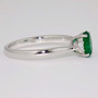 18ct white gold oval cut emerald and round brilliant cut diamond ring side