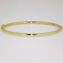 9ct gold oval hinged bangle