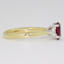 18ct gold and platinum oval cut ruby and round brilliant cut diamond ring side