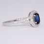 18ct white gold oval cut sapphire and diamond cluster ring with diamond shoulders side