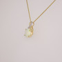 9ct gold oval opal and diamond twist pendant side