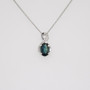 9ct white gold oval cut teal sapphire and diamond swirl pendant