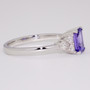 9ct white gold emerald cut tanzanite and round brilliant cut diamond ring side