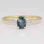 9ct gold teal sapphire ring and diamond ring