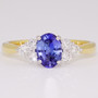 18ct gold and platinum oval cut Ceylon sapphire and round brilliant cut diamond ring