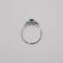 Platinum oval cut Ceylon sapphire and round brilliant cut diamond ring top