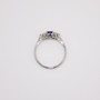 Platinum oval cut sapphire and round brilliant cut diamond ring top