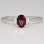 Platinum oval cut ruby and baguette cut diamond ring Platinum oval cut ruby and baguette cut diamond ring