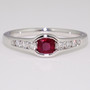Platinum cushion cut ruby and diamond channel-set ring