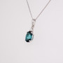 9ct white gold oval cut indicolite tourmaline and round brilliant cut diamond pendant side