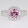 Platinum unheated pink cushion cut tanzanite and diamond halo ring with diamond-set shoulders